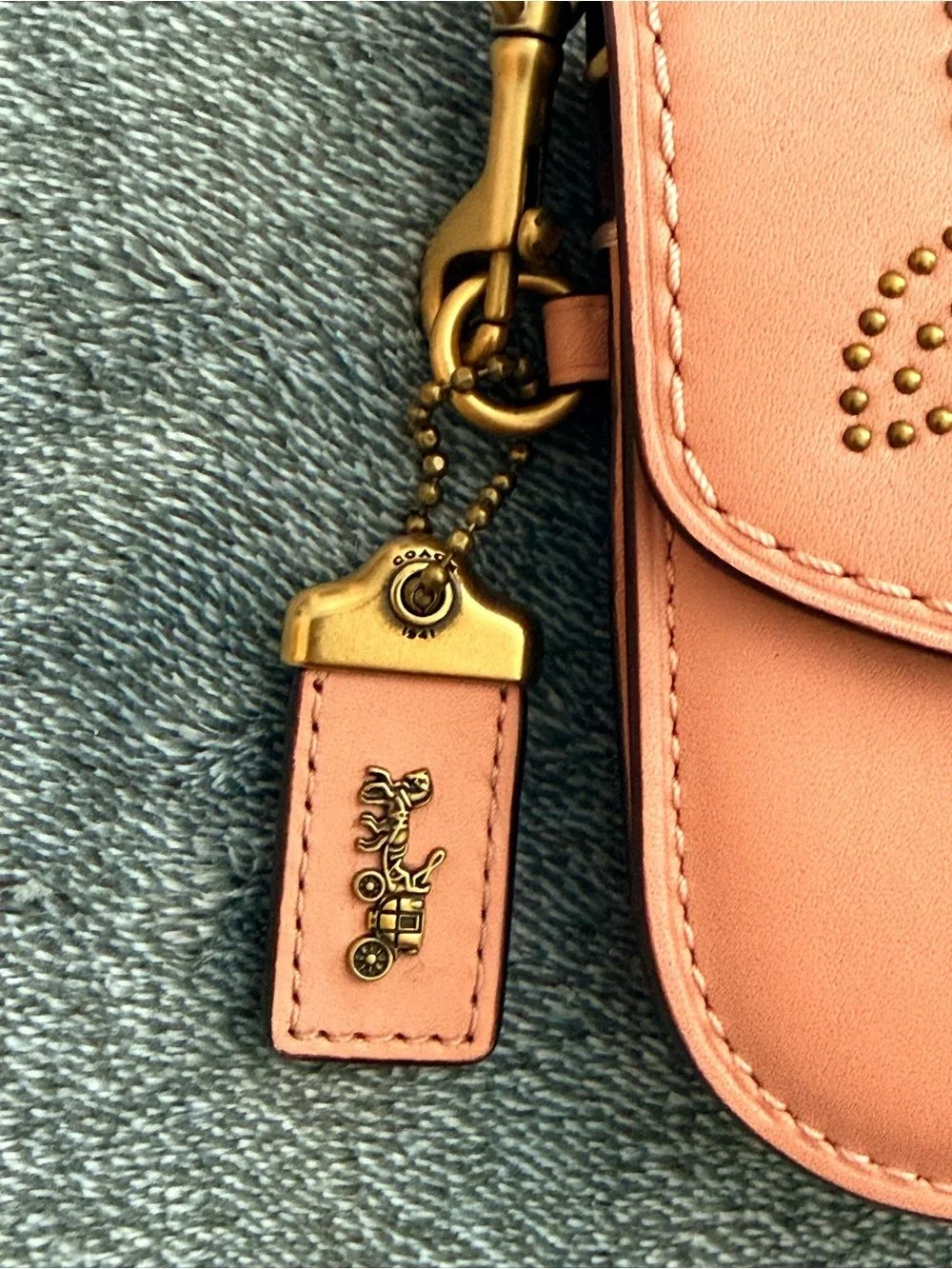 Coach 1941 peony tea rose rivets studded clutch